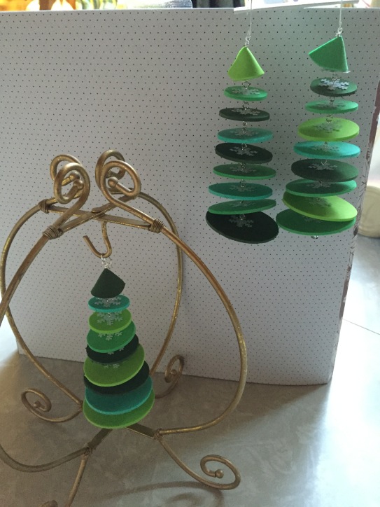 Three green foam tree ornaments.