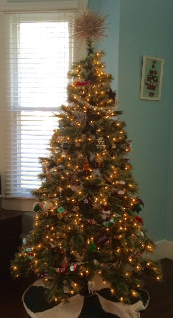 Photo of full tree and topper.